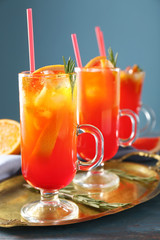 Fresh summer cocktail in glass cups on metal tray