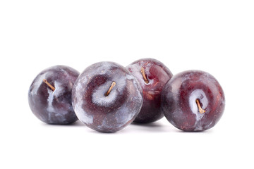 Plums on white background isolated close up
