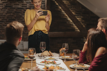 Friends Enjoying at Dinner Party