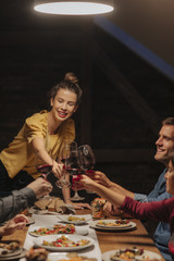 Friends Enjoying at Dinner Party