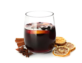 Glass of delicious mulled wine on white background