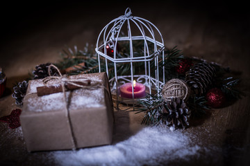Fototapeta na wymiar Christmas card. Christmas candle and Christmas gift