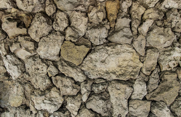 Texture of an old stone wall. Close-up.
