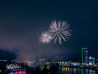 Bright fireworks above Minsk downtown. Beautiful night city panoramic view. 