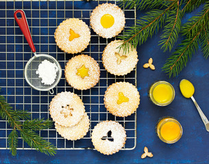 Christmas biscuits (linzer), with lemon and orange jam.