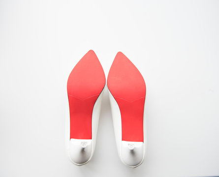 White bridal shoes with red sole