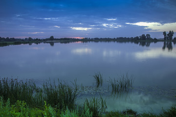Obraz na płótnie Canvas Evening view of the lake