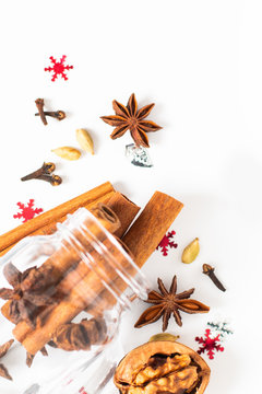 Holiday Food background Christmas spices Star anise, cloves and cadamon pods on white background