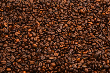 Coffee beans background. Top view. Coffee beans texture.