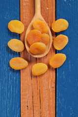 Spoon with dried apricots