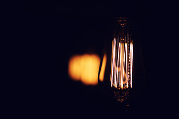 Lamps with tungsten filament. Edison's light bulb. Filament fila