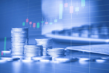 Stack of money coin with trading graph, financial investment concept use for background