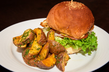 Burger with wedges potatoes