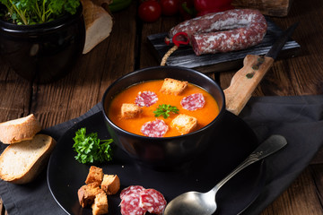 Hungarian paprika cream soup with spicy sausage