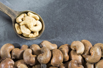Fototapeta na wymiar Cashew nuts on the table - Anacardium occidentale