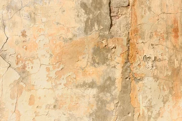 Selbstklebende Fototapete Alte schmutzige strukturierte Wand Textur des alten abblätternden gelben Putzes