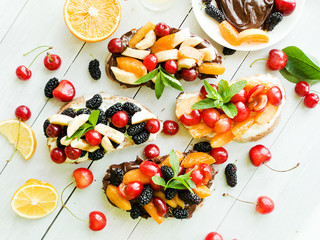 Toasts with chocolate and fruits