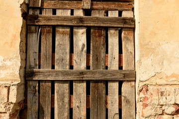 old fence of boards in the aperture