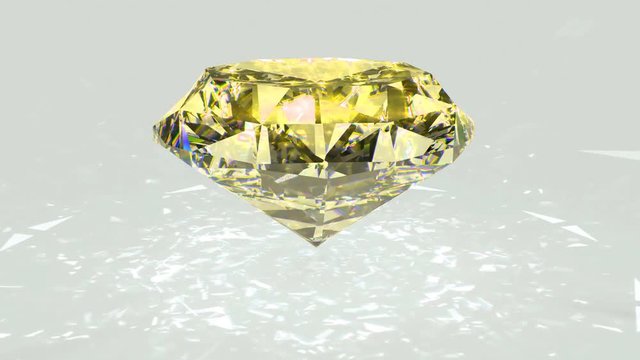 Yellow diamond dispersion footage. Crystal clean gem. Round diamond cut animation with light rainbow on surface. Silver bright video. 3D animation of shiny gem stone