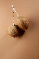 Tropical coconut with straw