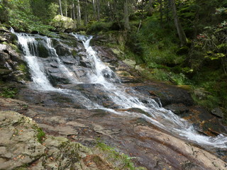 wild waterfall in the landscape of the bavarian forest