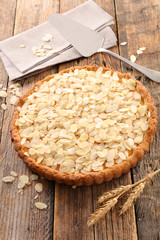 almond cake on wood background