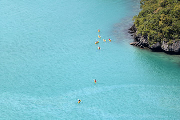 Top view of kayaking groups around the island