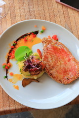 plate of tuna steak and its vegetable garnish in a french restaurant

