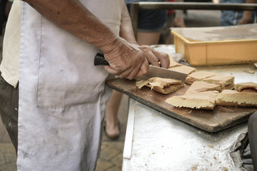 Delicious sweet hot cake with peanuts in the streets of Kuala Lumpur, Malaysia