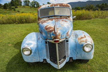 Old rusty truck and old caravan in Stowe Vermont