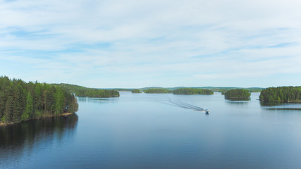 Obraz na płótnie Canvas view at beautiful päijänne lake with boat