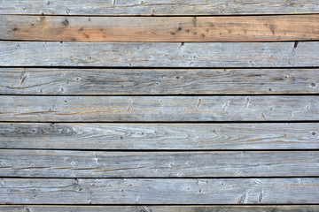 Rustikaler Hintergrund aus verwitterten Lärchenholzbrettern