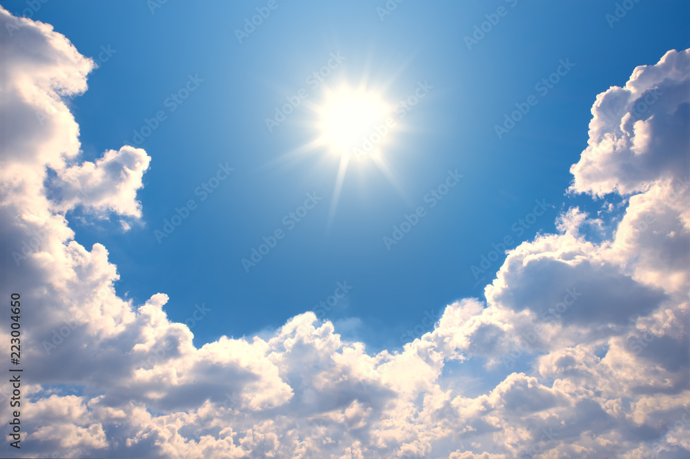 Wall mural blue sky with clouds and sun reflection.the sun shines bright in the daytime in summer