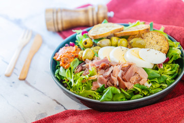 Fresh fruits salad and ham with egg