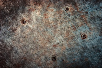 metallic shabby colored background with iron rusty rivets