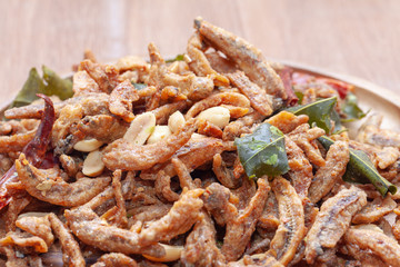 close up of Crispy deep fried small fish on plate