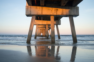 Beautiful perspective of a pier at Jacksonville beach, Florida, United States. Beautiful perspective of the pier
