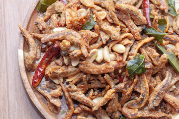 close up of Crispy deep fried small fish on plate