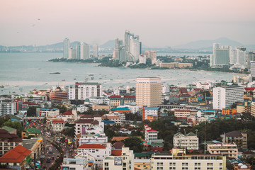 Pattaya cityscape from aerial view. Resort city in Thailand. Asian architecture.