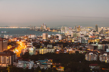 Fototapeta na wymiar Pattaya cityscape from aerial view. Resort city in Thailand. Asian architecture.