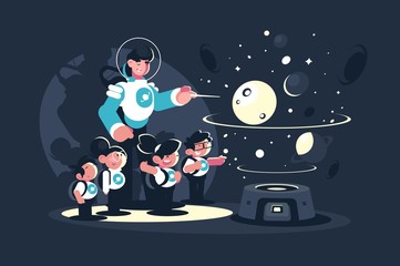 Guide with school children in planetarium