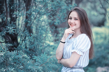 A girl in a spring green park