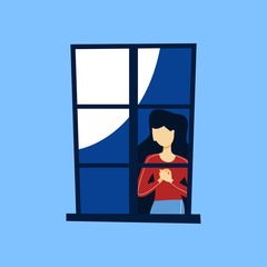Woman looking out of the closed window