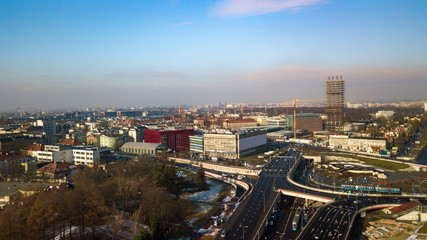 Fototapeta na wymiar Panorama with a tower block being built
