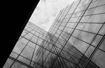 Perspective of modern glass window at skyscrapers - monochrome