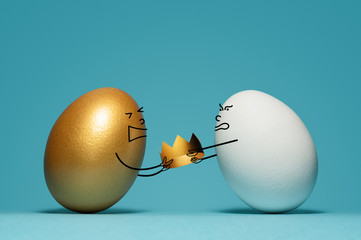 Leadership tussle among two opponents (eggs). Concept of competition.