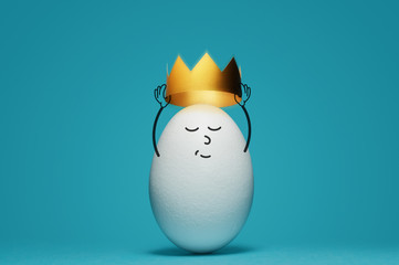 A white egg is dressing a gold crown on blue background. Concept of success.