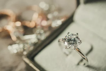 Fotobehang luxury engagement Diamond ring in jewelry gift box © Piman Khrutmuang