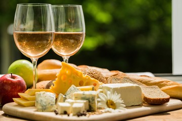 Glasses of Wine with Cheese, Bread and Apples