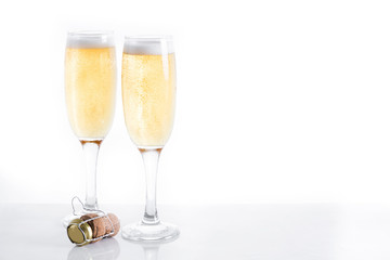 Champagne glasses isolated on white background. Copyspace